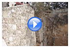 Видео: Вид с востока на арки византийской церкви и раскопанную часть южного бассейна