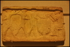 Глиняная фигура. Из Ларсы, 2000-1600 гг. до Р.Х. Британский музей. ME 91906. Два человека борются, при этом музыканты играют на барабанах.