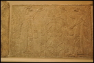 Две фигуры духов-хранителей с головами орла. Нимруд, ок. 865-860 гг. до Р.Х. Британский музей. WA 124583.