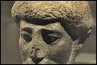 Голова статуи бородатого человека. Гранит, Поздний период Птолемеев, I в. до Р.Х. Берлинский Новый музей. AM 10660.