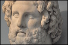 Портрет бога Асклепия. Мрамор, с о. Мелос (Эгейское море),  325-300 гг. до Р.Х. Британский музей. GR 1867.5-8.115. Голова являются частью огромной храмовой статуи бога Асклепия.